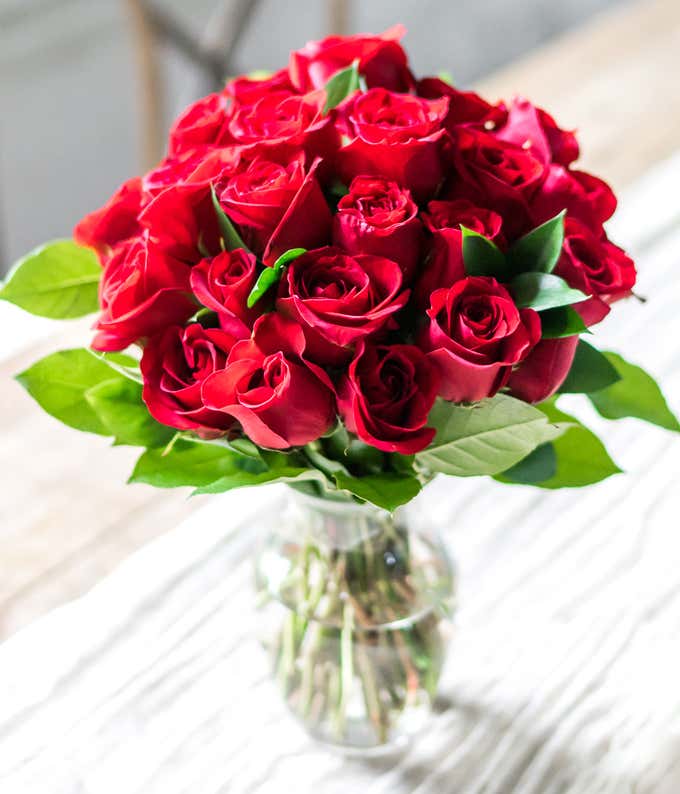 Two Dozen Red Roses in a Clear Glass Vase at From You Flowers