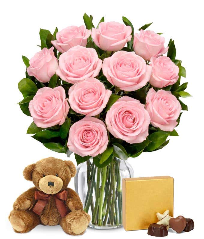 One dozen pink roses, teddy bear and box of chocolates