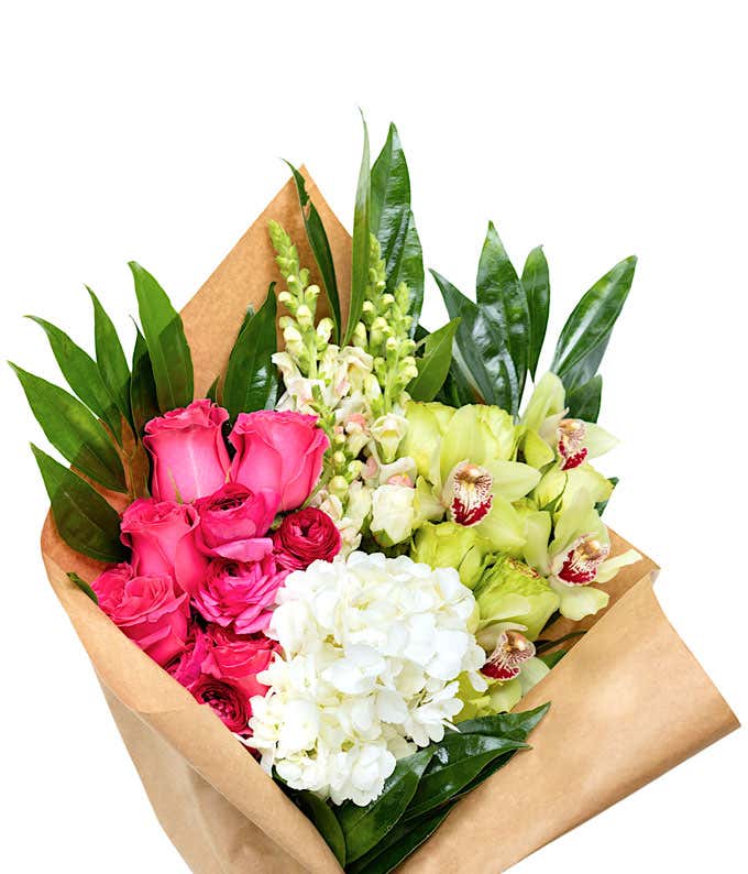 Wrapped bundle of Pink, White, and Green flowers.