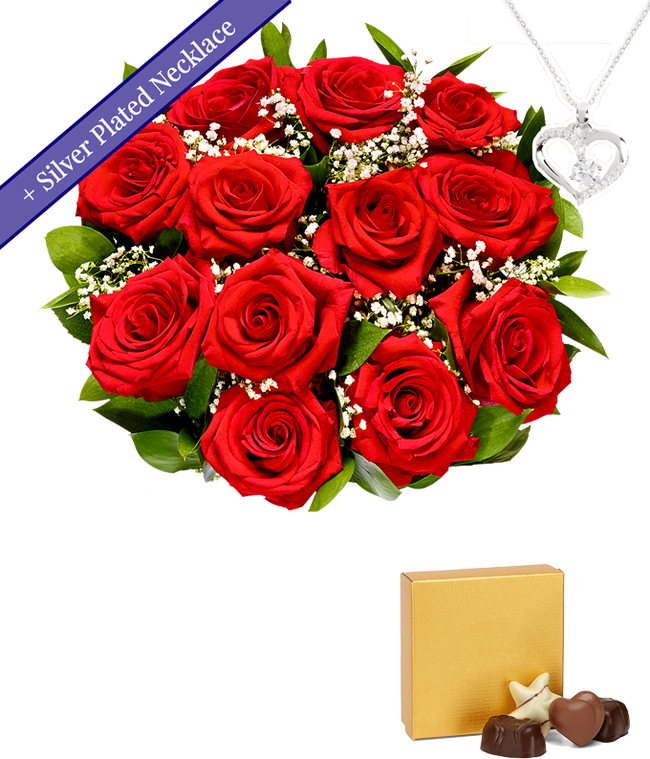 Partial image of One dozen red roses with a silver heart necklace on a chain and a small box of assorted chocolates without vase.