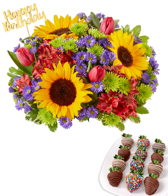 Partial image of Flower arrangement with sunflowers, red alstroemeria, green poms, purple asters, and red tulips in a clear glass vase, with a gold Happy Birthday pick and paired with chocolate-covered strawberries, including rainbow sprinkle and drizzles. without vase.