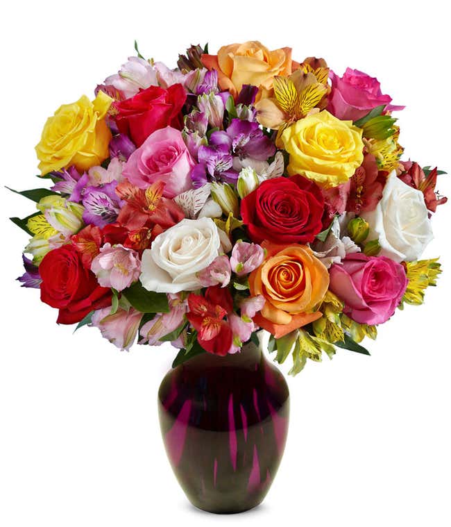 A bouquet of 12 mixed roses and alstroemerias, with an optional vase.