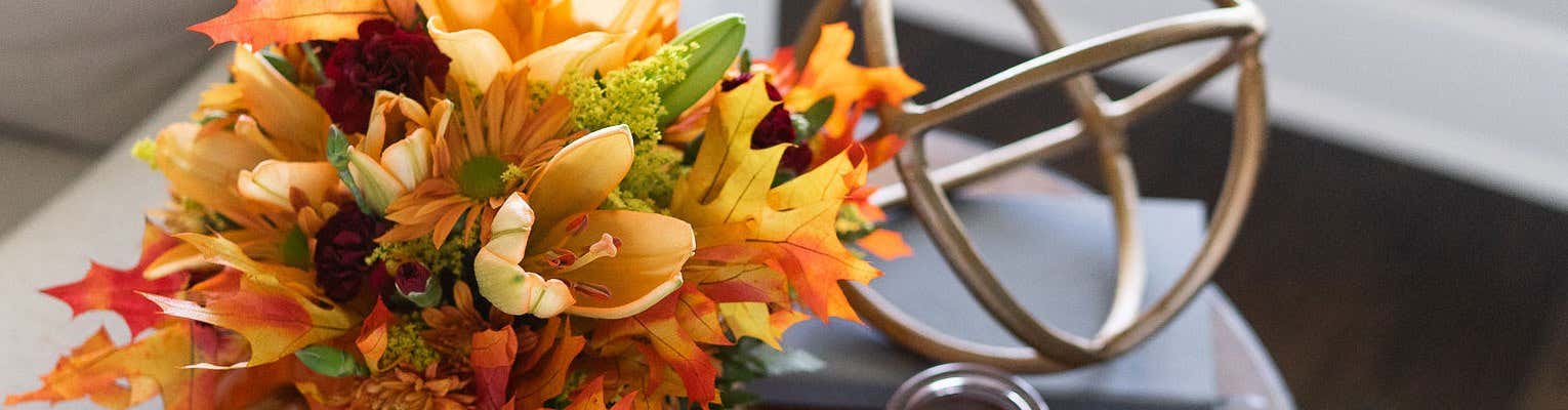 Blue and yellow bouquet on a table - shop now
